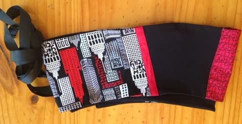 Red and black belt with New York skyline. $40.00.
Will fit most sizes.