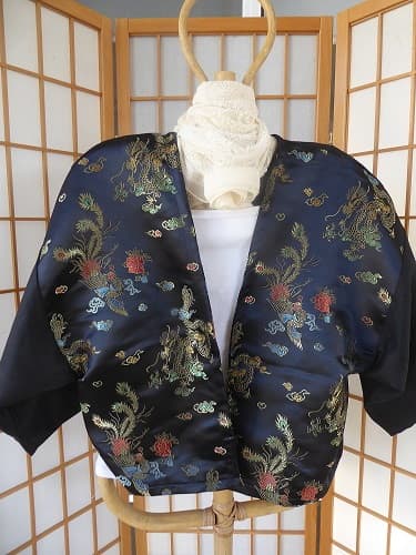 Kimono linen jacket. These jackets are loose fitting and will fit between size 10 - 16. You may like to wear a belt around this jacket to make it more fitted. $70.00