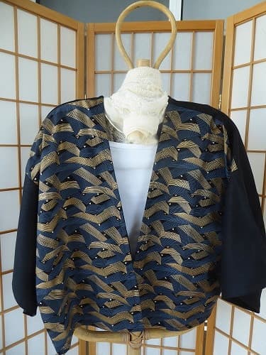 Kimono linen jacket. These jackets are loose fitting and will fit between size 10 - 16. You may like to wear a belt around this jacket to make it more fitted. $70.00