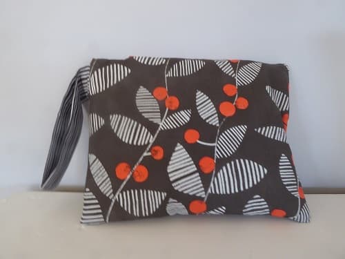 Orange berry bag with wrist strap  - $10.00